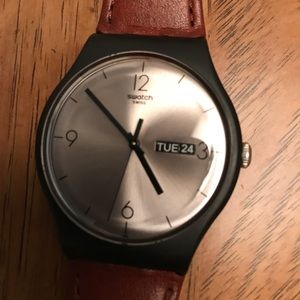 Men’s swatch watch.